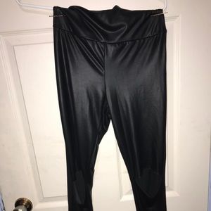 Faux leather leggings with holes at the knee
